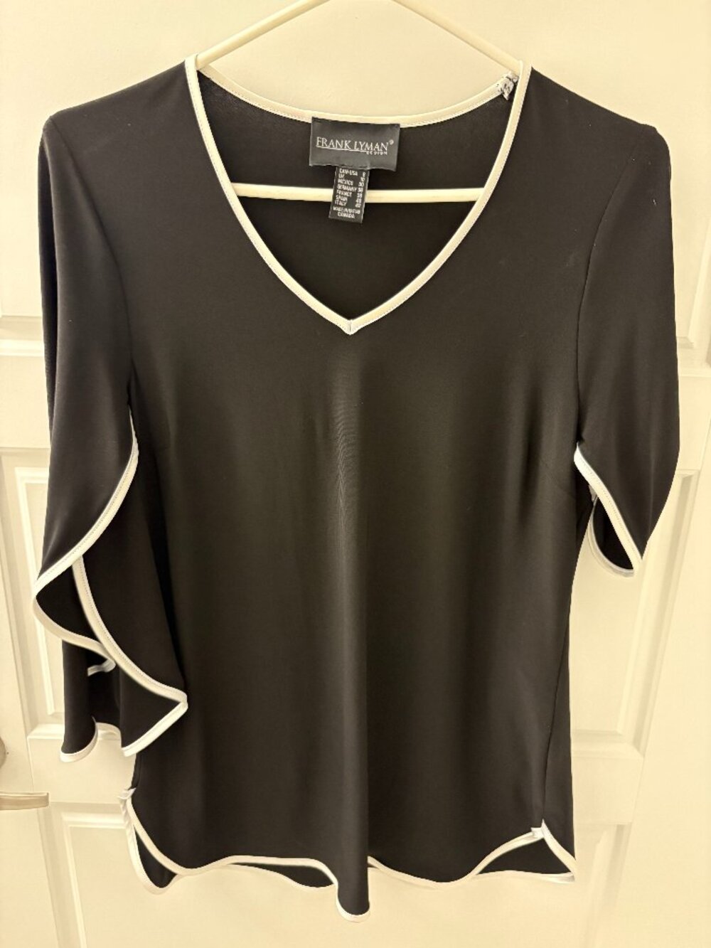 Frank Lyman black top trimmed with white size 8